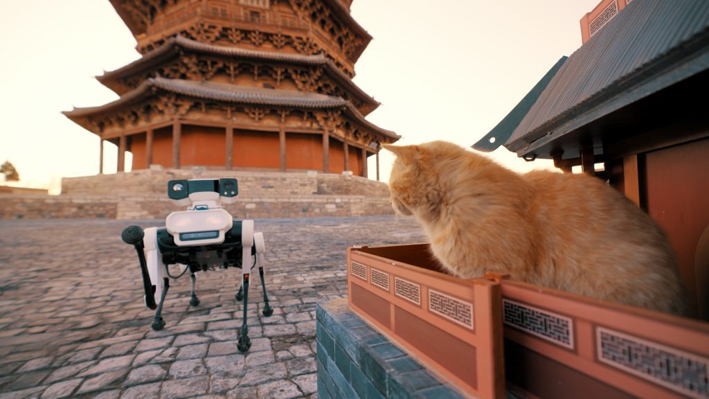 Lenovo Daystar Robot, a six-legged intelligent robot dog, completes a mission at the historic Yingxian Wooden Pagoda. With cat.